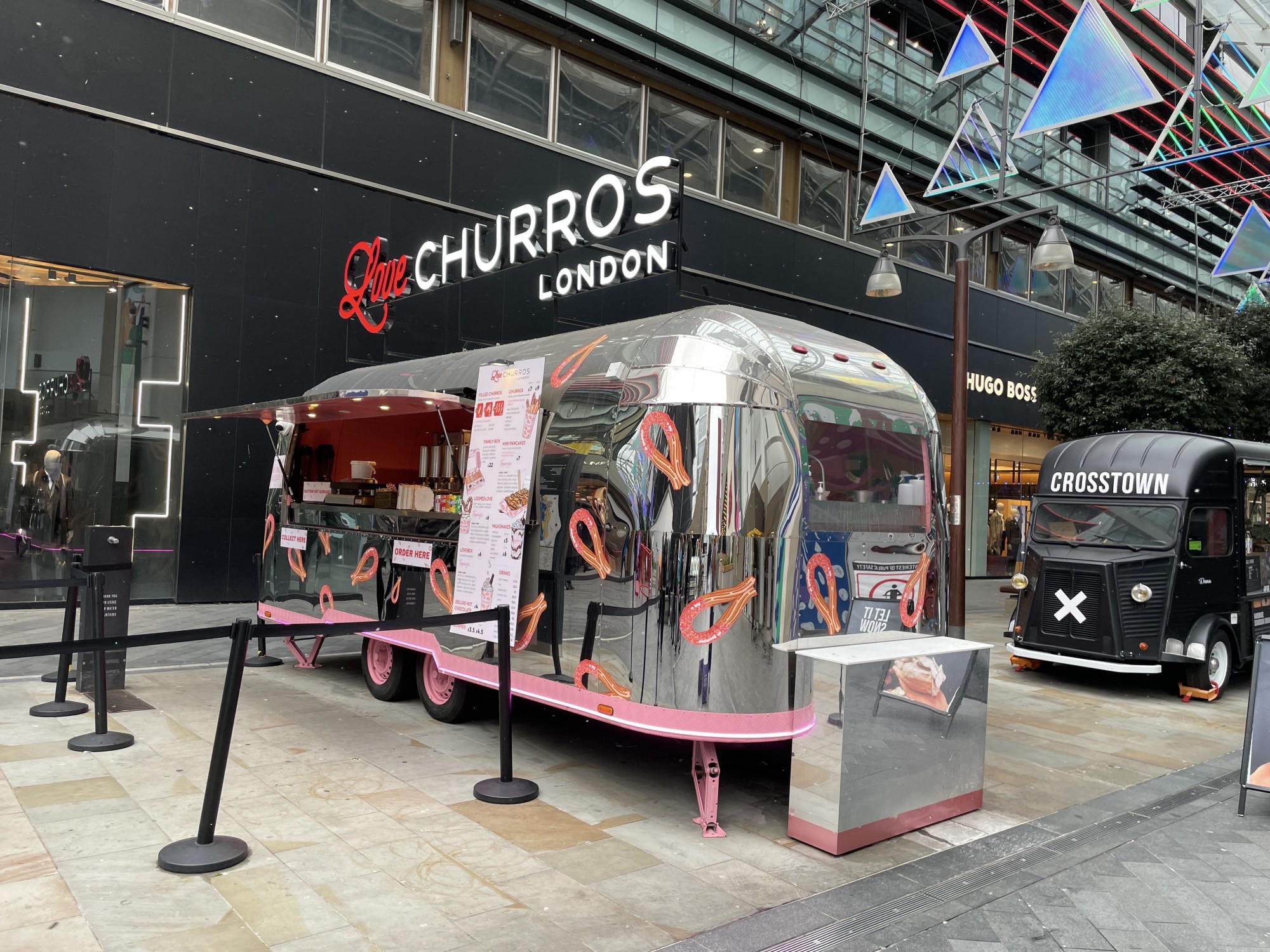 A food truck outside of a building 